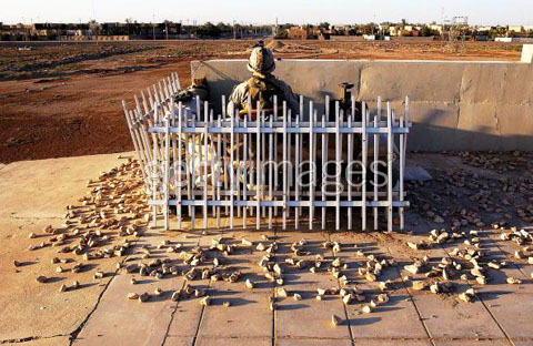 US Marines of 2nd Battalion 1st Marine Regiment maintain their cordon at the key flashpoint Fallujah railway station on May 6, 2004 in Iraq.